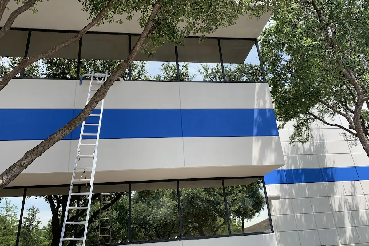Miracle Cleaning Pros cleaner washing commercial windows